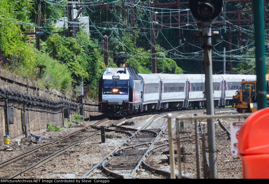 The 1:34 PM Westbound Train to Dover, NJ approaching on Track 1, 